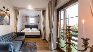 Posteľ alebo postele v izbe v ubytovaní Apartamenty Kapitańskie