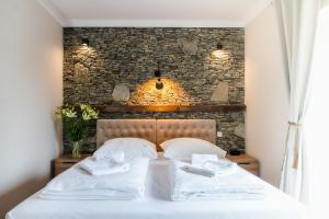Posteľ alebo postele v izbe v ubytovaní Apartamenty Kapitańskie