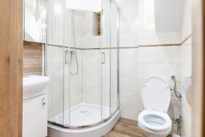 Kúpeľňa v ubytovaní Apartamenty Kapitańskie