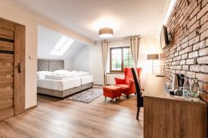 Posteľ alebo postele v izbe v ubytovaní Apartamenty Kapitańskie