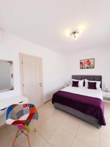 A bed or beds in a room at Bella House Nikiti