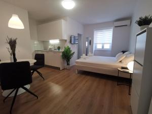 Posteľ alebo postele v izbe v ubytovaní Marina Rijeka Center apartments