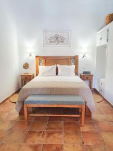 Ein Bett oder Betten in einem Zimmer der Unterkunft Monte do Brejinho de Água