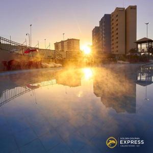 O pôr ou nascer do sol visto do apart-hotel ou dos arredores