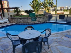 A piscina localizada em GOLDEN DOLPHIN Resort - Grand & Express - Caldas Novas - COM TV A CABO - Aguas Termais ou nos arredores
