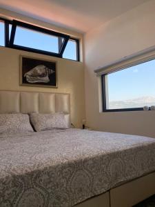 מיטה או מיטות בחדר ב-Martin Lux Apartment