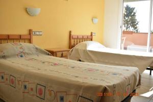 Posteľ alebo postele v izbe v ubytovaní VILLA Santa Susanna