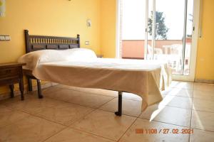 Posteľ alebo postele v izbe v ubytovaní VILLA Santa Susanna