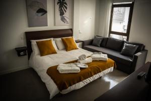 Postel nebo postele na pokoji v ubytování LOFT EL PATIO