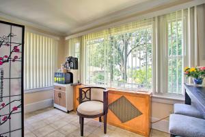 a room with a desk with a chair and a window at Charming Yonkers Retreat - 10 Mi to Central Park! in Yonkers