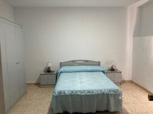Katil atau katil-katil dalam bilik di Cortijo rural La Parrilla