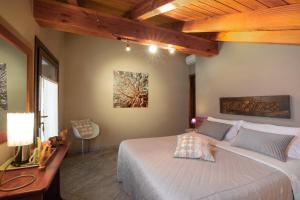 Postel nebo postele na pokoji v ubytování b&b Al Castel
