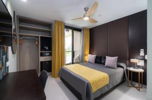 Кровать или кровати в номере Hotel Perla del Sur