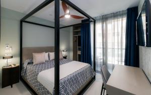 Кровать или кровати в номере Hotel Perla del Sur