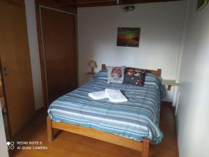 Postel nebo postele na pokoji v ubytování Casa Campo