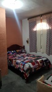 Cama o camas de una habitación en Rancho Colcha de Retalho