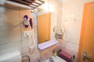 Koupelna v ubytování Apartments Lavanda & Cappuccino + 33 fotografií