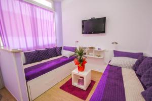 Ένα ή περισσότερα κρεβάτια σε δωμάτιο στο Apartments Lavanda & Cappuccino