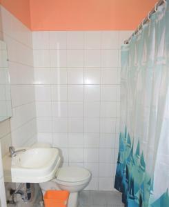 Een badkamer bij Hotel Asunción