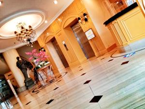 TV a/nebo společenská místnost v ubytování The Grand Dame Hotel