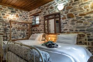 Posteľ alebo postele v izbe v ubytovaní Helene Eco Luxury Villa