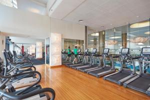 a gym with rows of cardio equipment in a building at Crown Towers Melbourne in Melbourne