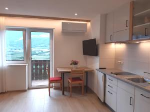 Kuchyňa alebo kuchynka v ubytovaní Haus Talblick "Wallbug" Ferienwohnung 1