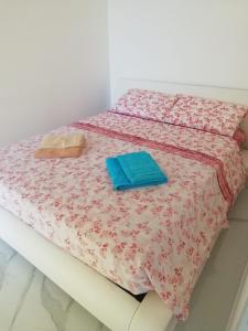 Postel nebo postele na pokoji v ubytování Venezia Apartman