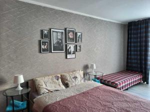  Кровать или кровати в номере Standard Brusnika Apartments Serpukhovskaya 