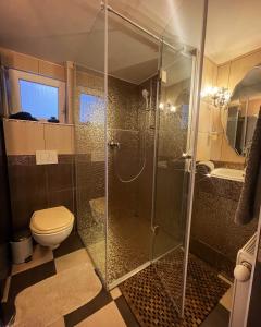 Ett badrum på Apartment Styria Lent
