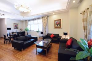 Uma área de estar em Timor Plaza Hotel & Apartments