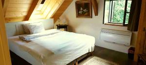 Postel nebo postele na pokoji v ubytování Heuholzmühle Privatzimmer