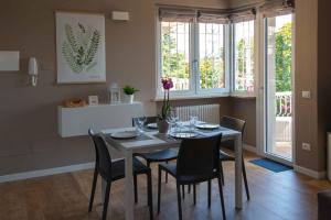 A seating area at Sirmio Apartments - Narnia Stay