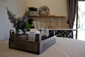 Postel nebo postele na pokoji v ubytování La Bastide Portoly B&B "Pruneaux"