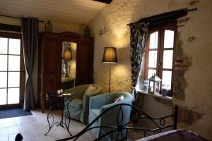Posezení v ubytování La Bastide Portoly B&B "Pruneaux"