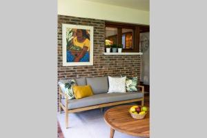 a living room with a couch and a table at Casa Rural Oroimena in Andoain