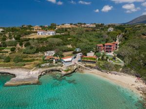 an aerial view of a resort on a beach at Aloe Studios, Waterfront Accommodation in Karavadhos