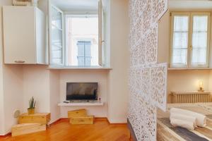 Μια τηλεόραση ή/και κέντρο ψυχαγωγίας στο Il Rifugio del Principe-ampio monolocale in centro