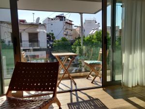 En balkong eller terrass på Sunny new lovely apartment 60 meters from the metro