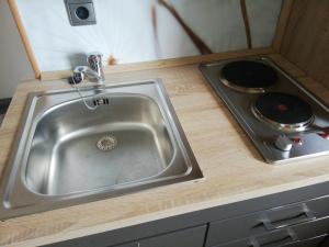 Kuchyň nebo kuchyňský kout v ubytování 1 ZI Appartement Zauberwald