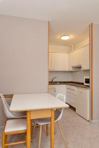 Kuchyň nebo kuchyňský kout v ubytování Duerming Velero Apartamentos