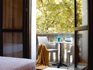 Posteľ alebo postele v izbe v ubytovaní Accanto Al Centro B&B