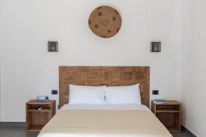 Postel nebo postele na pokoji v ubytování Albergo Rurale Casa Fois