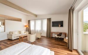 TV a/nebo společenská místnost v ubytování Hotel Mandelhof