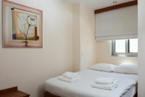 Postel nebo postele na pokoji v ubytování Hotel Galaxias