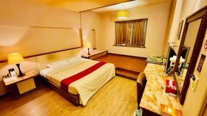 Postel nebo postele na pokoji v ubytování Dong Zhi Gang Motel