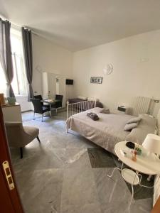 A bed or beds in a room at le ginestre in centro