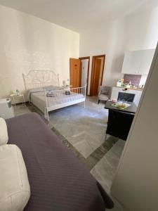 A bed or beds in a room at le ginestre in centro