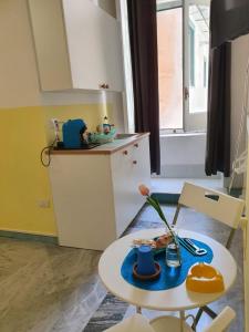 A kitchen or kitchenette at le ginestre in centro