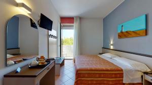Posteľ alebo postele v izbe v ubytovaní Hotel Excelsior + 37 fotografií